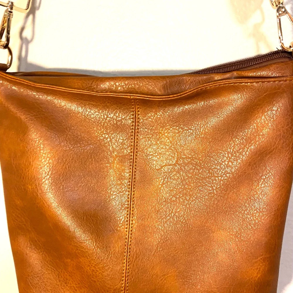 NWOT Hobo bag. Natural brown with colorful fabric adjustable strap.